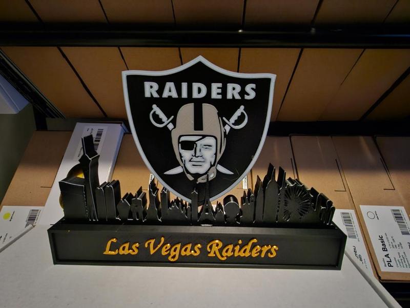 las vegas raiders with skyline of Las Vegas NFL