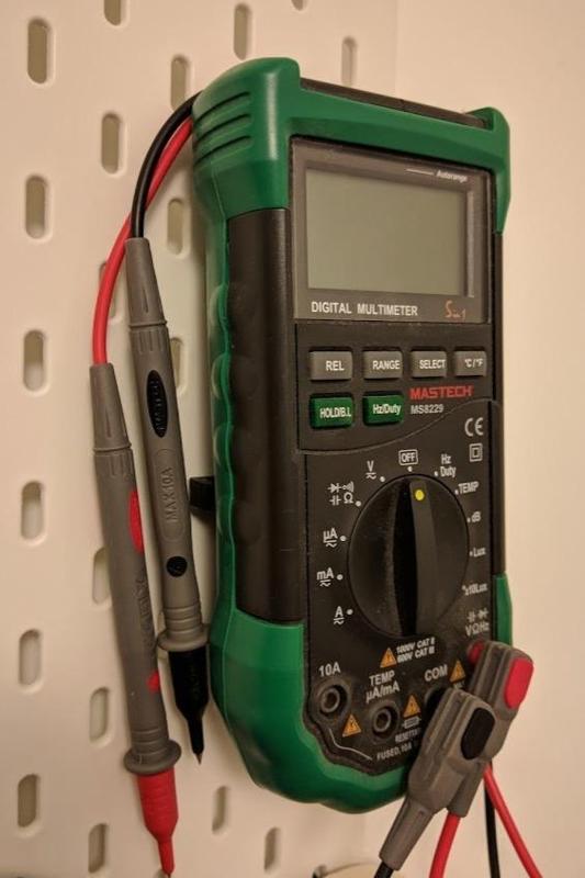 Multimeter holder for IKEA SKADIS pegboard