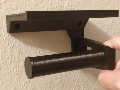 Wall mounted bathroom toilet roll holder with small table for smartphones, one piece.