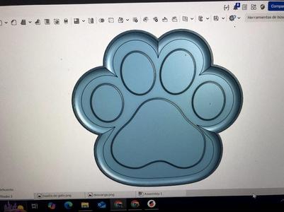 Little cat dish with the shape of a paw