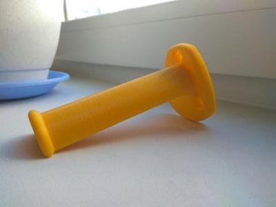 Filament spool holder on plywood