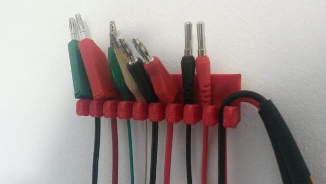 Multimeter test leads hanger