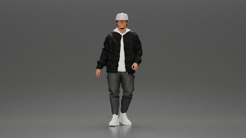 Stylish urban man walking in black jacket white hoodie cap and sneakers