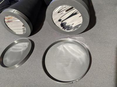 Parametric solar filter for binoculars, with nubs for soft lens border