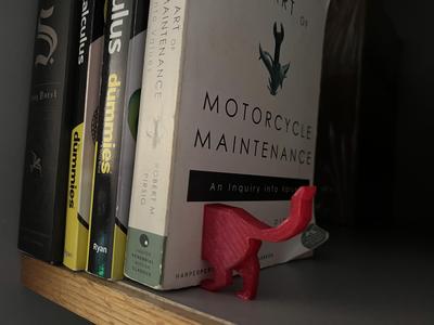 Cat butt bookend