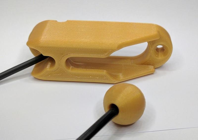 Rope, Cable or Cord holder and ball