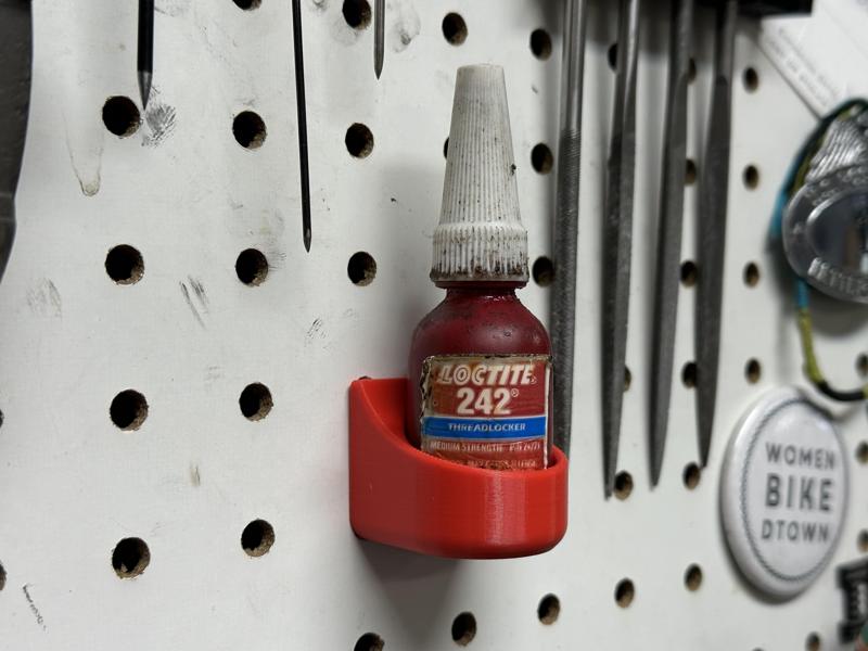 Pegboard holder for single bottle of LocTite