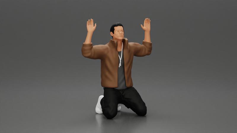 Asian gangster man in jacket sitting with his hands up ready to be arrested