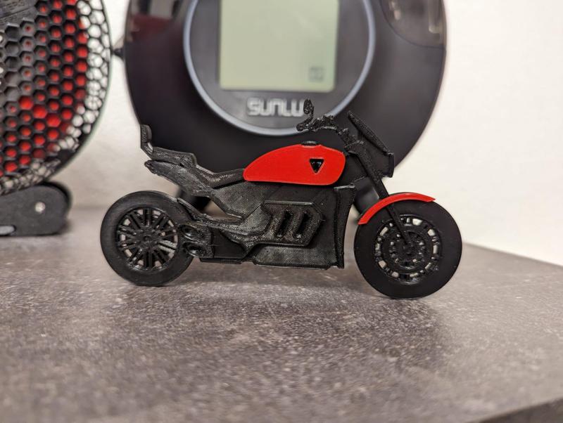 Trimuph rocket 3 miniature