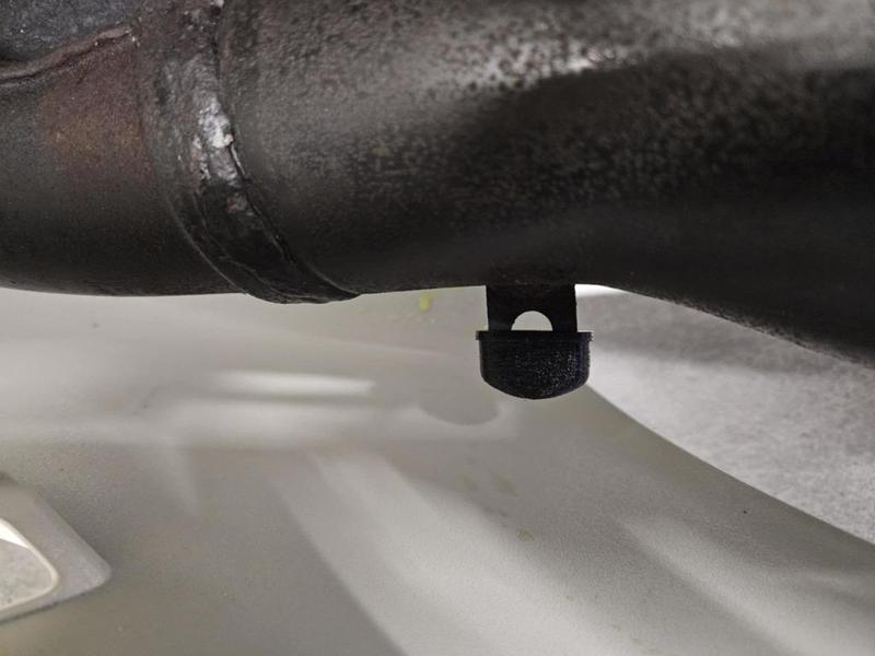 KR1250 exhaust chamber to fairing spacer