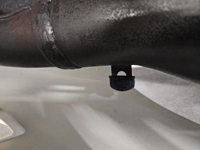 KR1250 exhaust chamber to fairing spacer