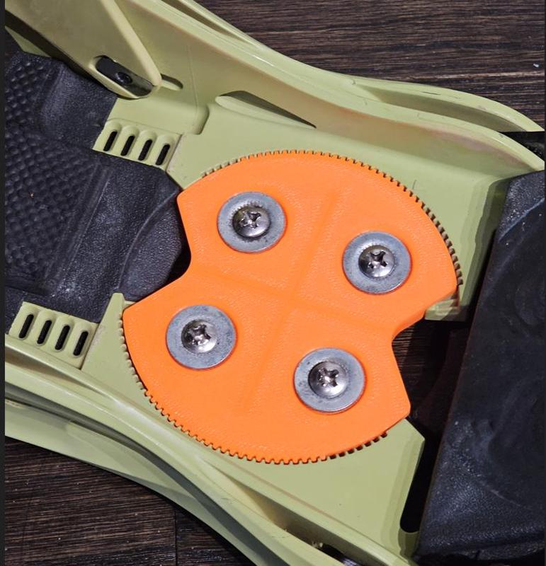 Snowboard binding plate