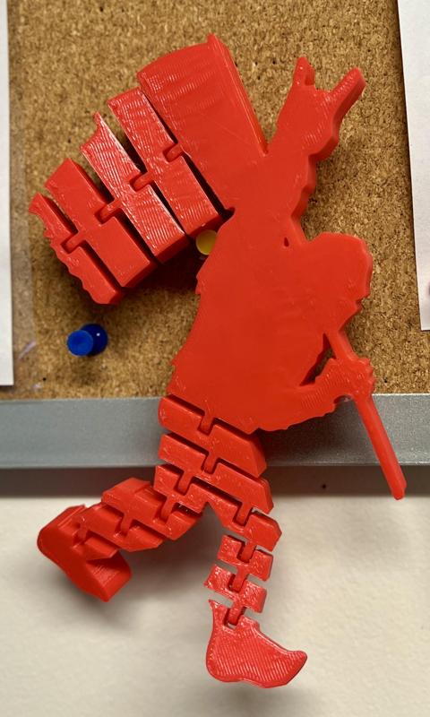 Flexi-Sasqutach carrying a flag