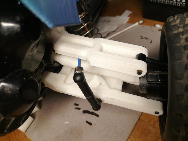 DT03 high travel rear upper wishbone