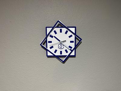 Square clock with square rotating arms