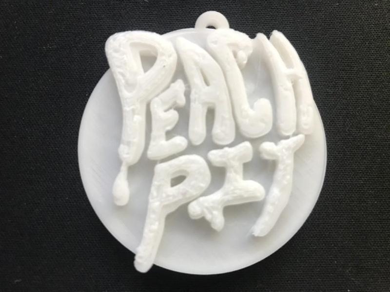 Peach Pit Band Keychain