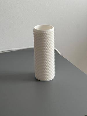 Cylinder vase with geometric structure