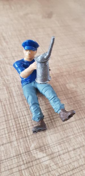 Railroad maintenance worker greaser