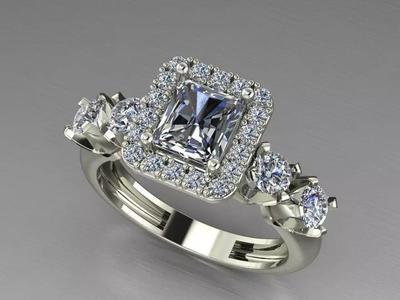 A HALO EMERALD  CUT  RING  WEEDING AND ENGAGEMENT RING