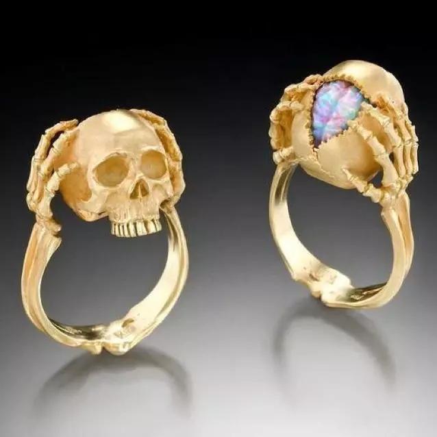 gold skull ring opal brain