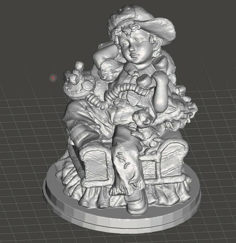 BOY SITTING IN LAZYBOY ON PHONE