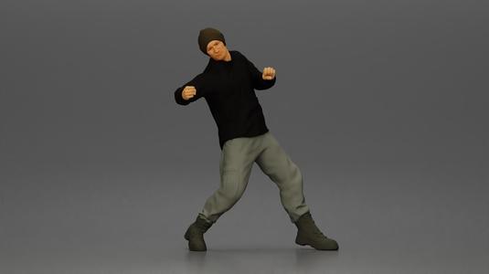 Asian Man in Hoodie and Cargo Pants Fighting with Strong Stance