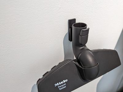 Miele vacuum spare head wall holder