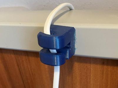 Magnetic cable holder