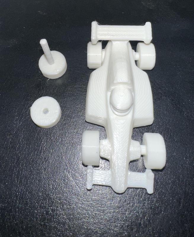 F1 Toon Car with spinning wheels.