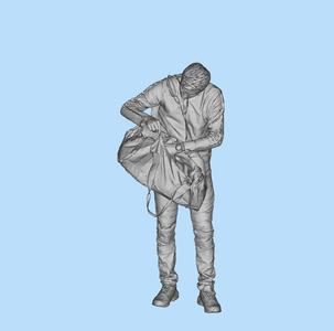 Man packing his backpack