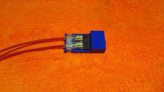Resettable fuse holder.