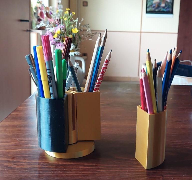 Spinning modular pen holder