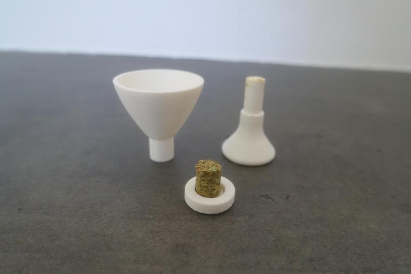 Pellet press funnel for dry herb vaporizers