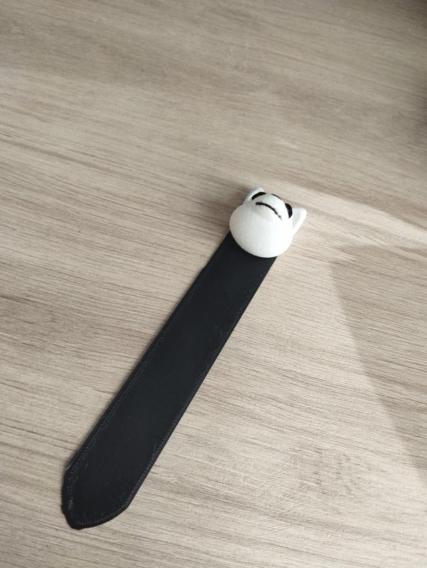 Punto de libro en forma de perro.