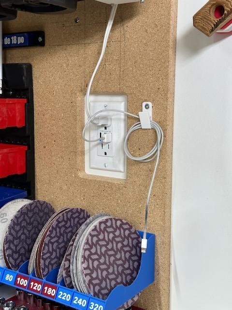 Wall mounted cable clip