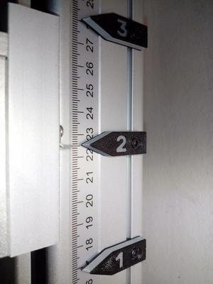 Sliding aiming mark for fiber laser