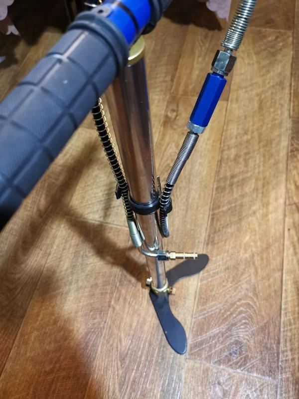 Hose holder for PCP hand pump.