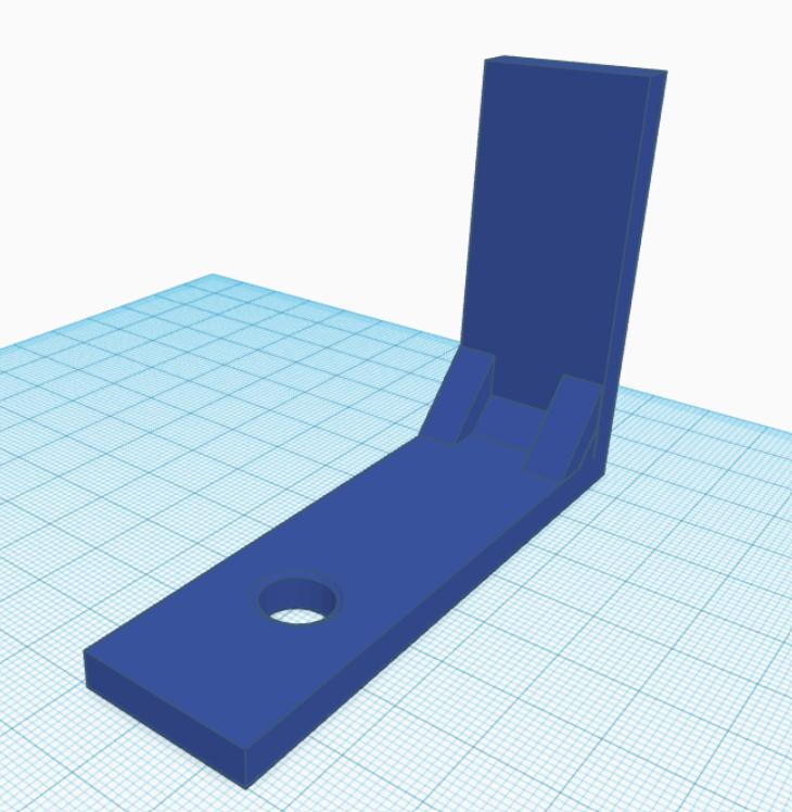 držák poličky nad umyvadlo