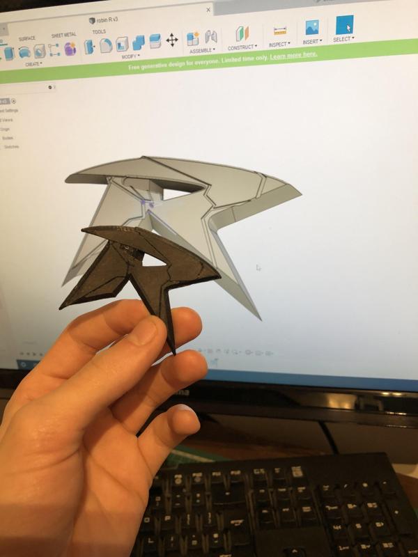 Robin throwing R from The Titans TV show