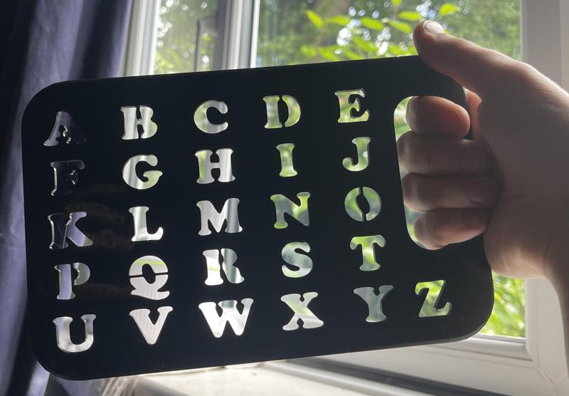 Handheld alphabet letterboard
