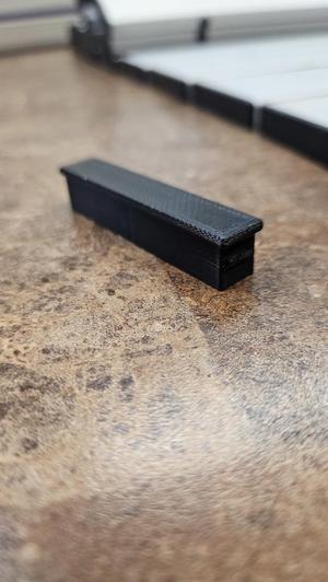 Folding slat camping table end cap