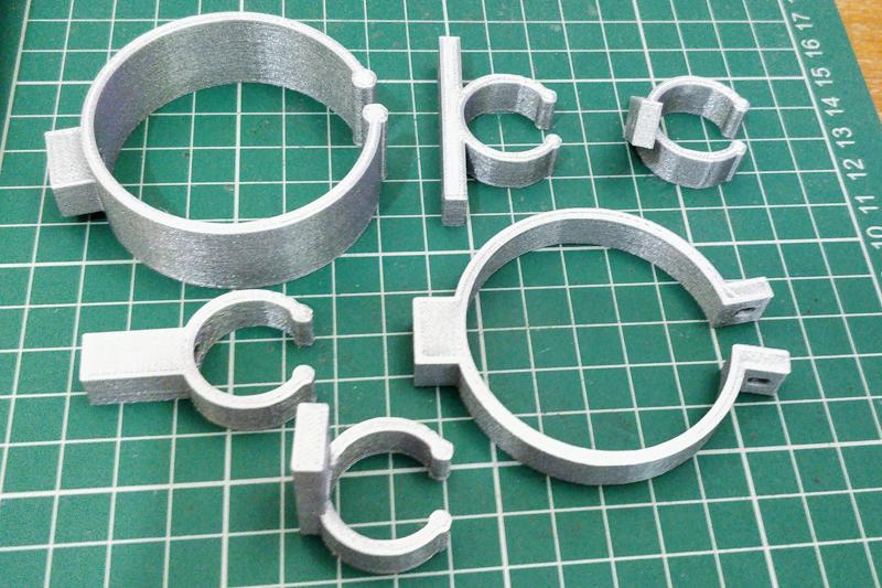 Customisable pipe clip/clamp