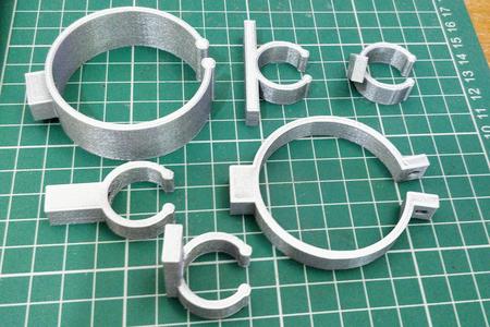 Customisable pipe clip/clamp