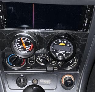 Single din dual gauge holder for miata