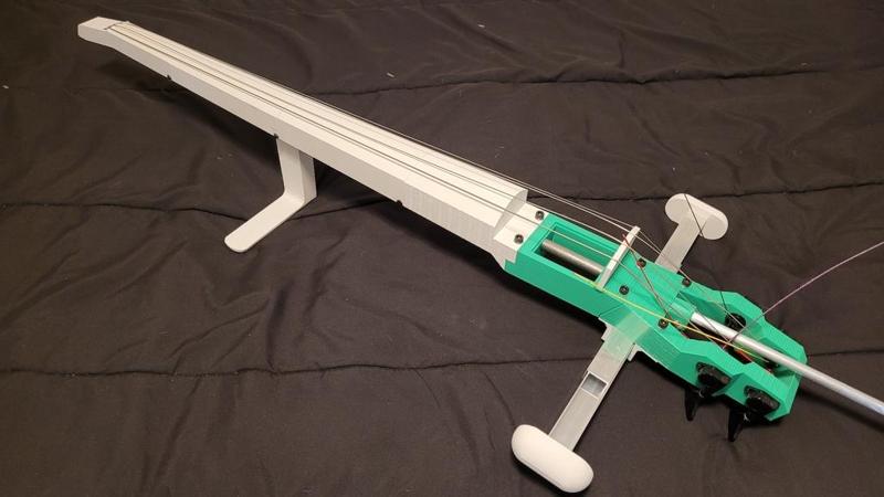 O'Cello with raised fingerboard, adjustable knee rest, and retracting endpin