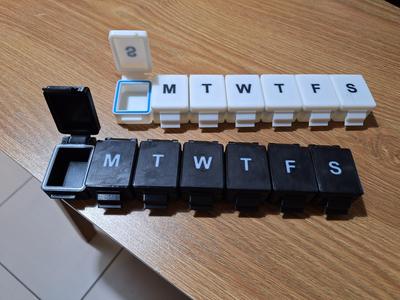 Day and night pill boxes