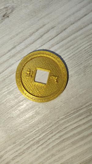 Ancient Chinese coin(Starověká Čínská mince) It's a coin that belongs in the basket.