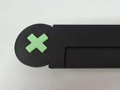 Cross badge