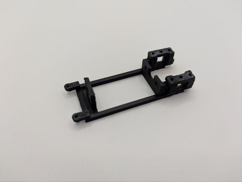 In-line slot/scalextric cradle.