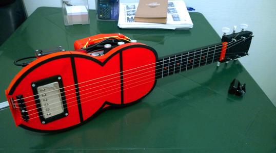 Travel guitar with built-in Amp and Speaker